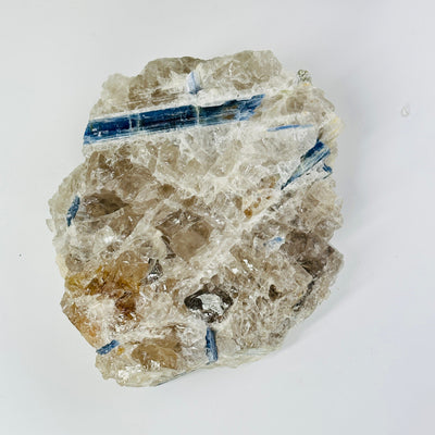 blue kyanite on matrix on white background