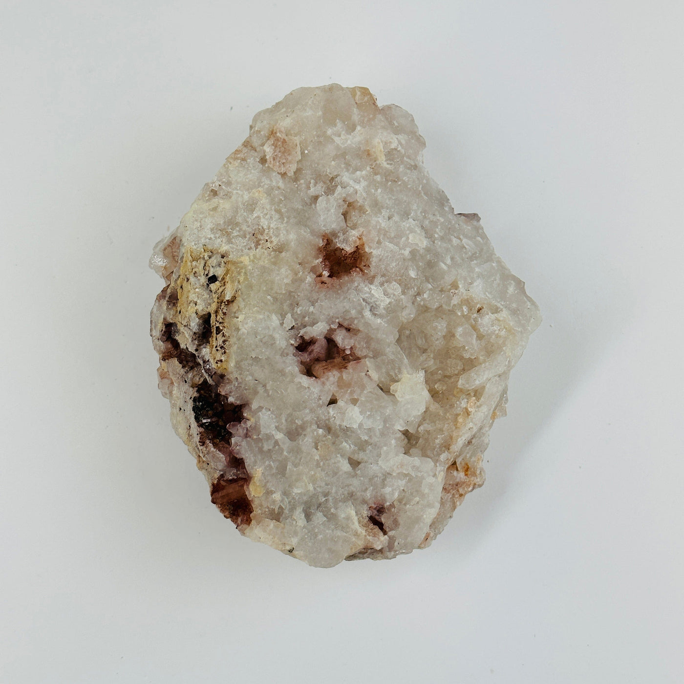 backside of lithium quartz formation on white background