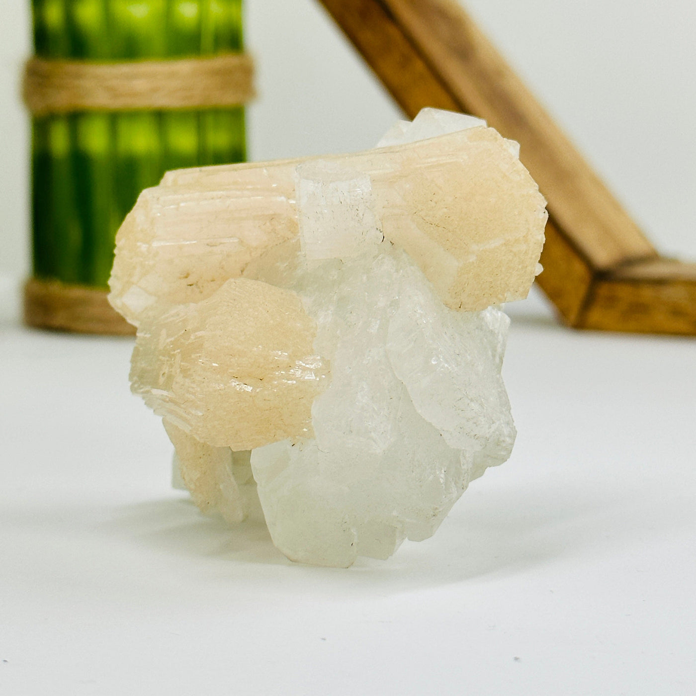 apophyllite with calcite formation with decorations in the background