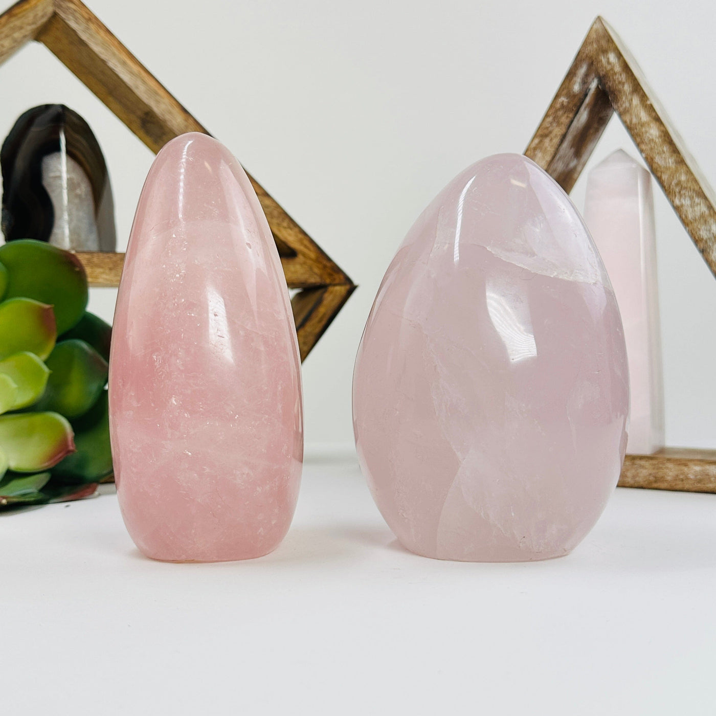 rose quartz cutbase with decorations in the background