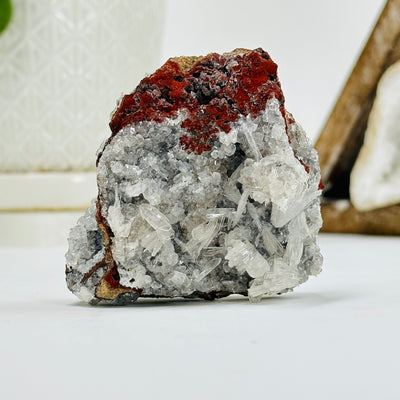 Mexican hemimorphite cluster with decorations in the background