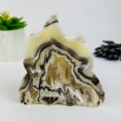 Mexican Onyx bowl with decorations on white background