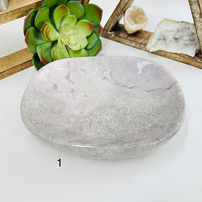 variant 1 of pink amethyst bowl with decorations in the background
