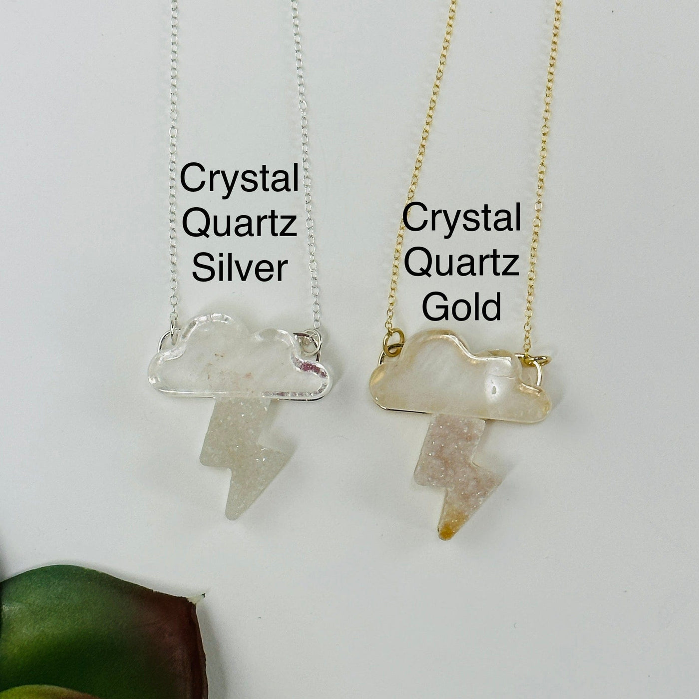 crystal quartz variant in both gold and silver on white background