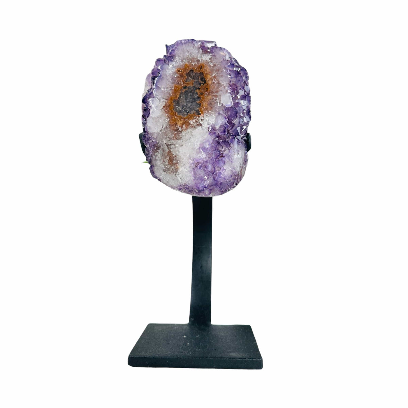 polished amethyst on stand on white background