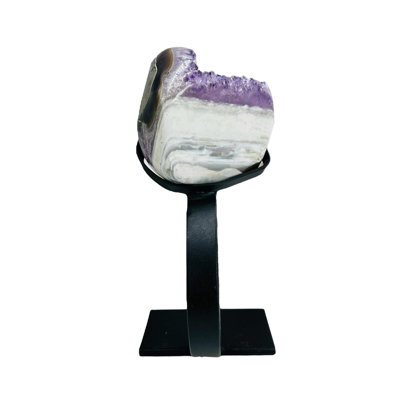 backside of amethyst with stand on white background
