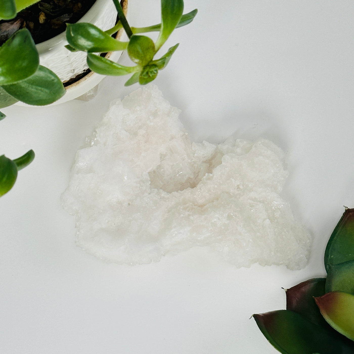 Halite cluster with decorations in the background