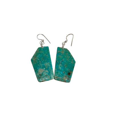 pair of turquoise earrings on white background