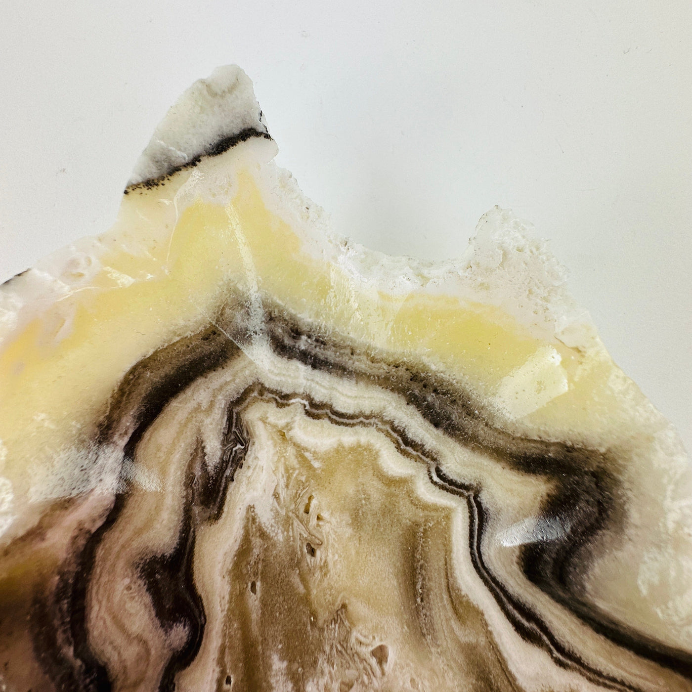 Up close shot of chipped area of Mexican onyx bowl