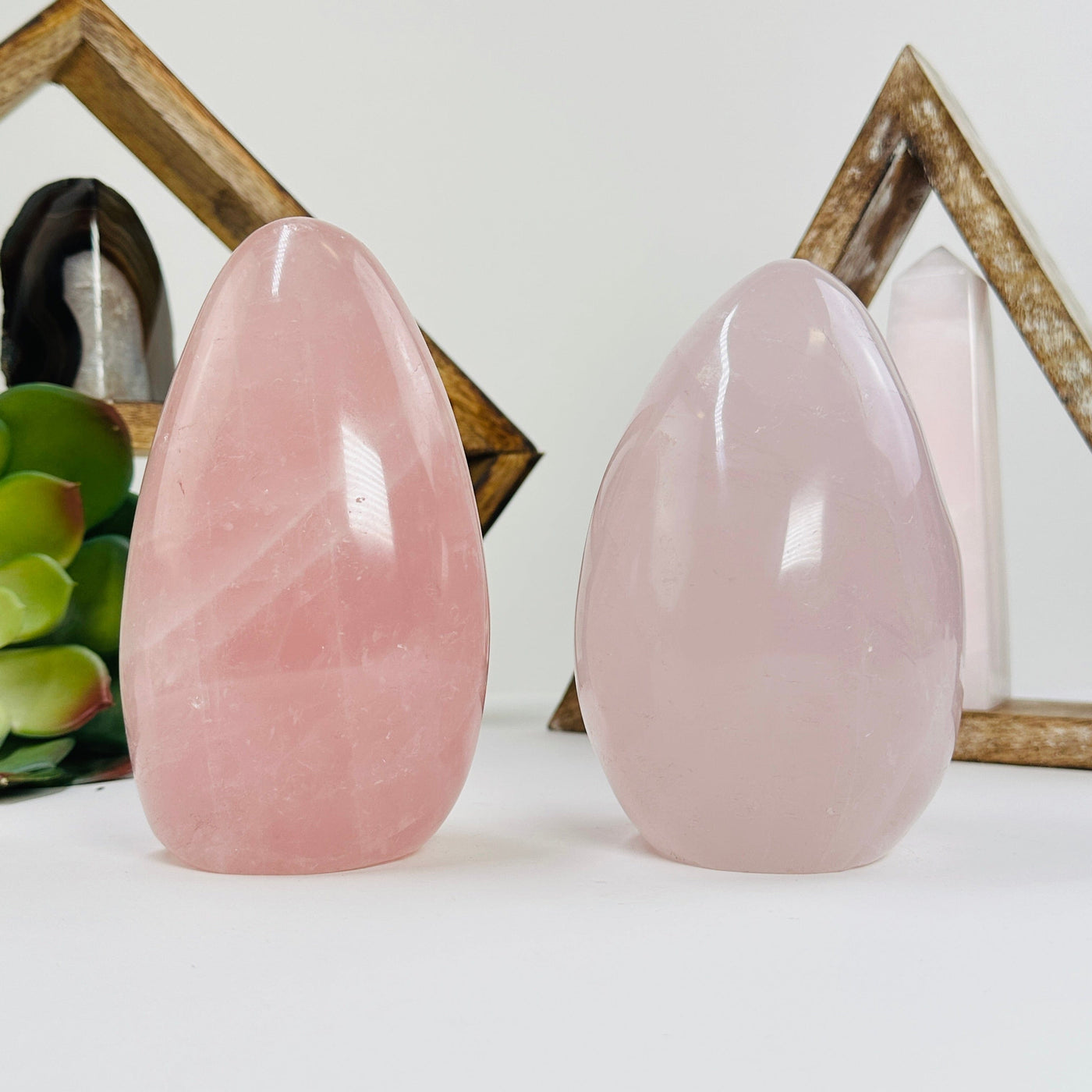 rose quartz cutbase with decorations in the background