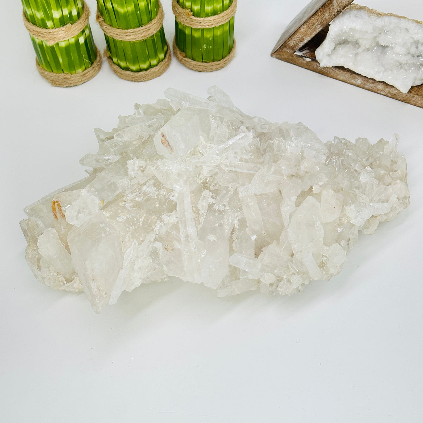 crystal quartz freeform with decorations in the background