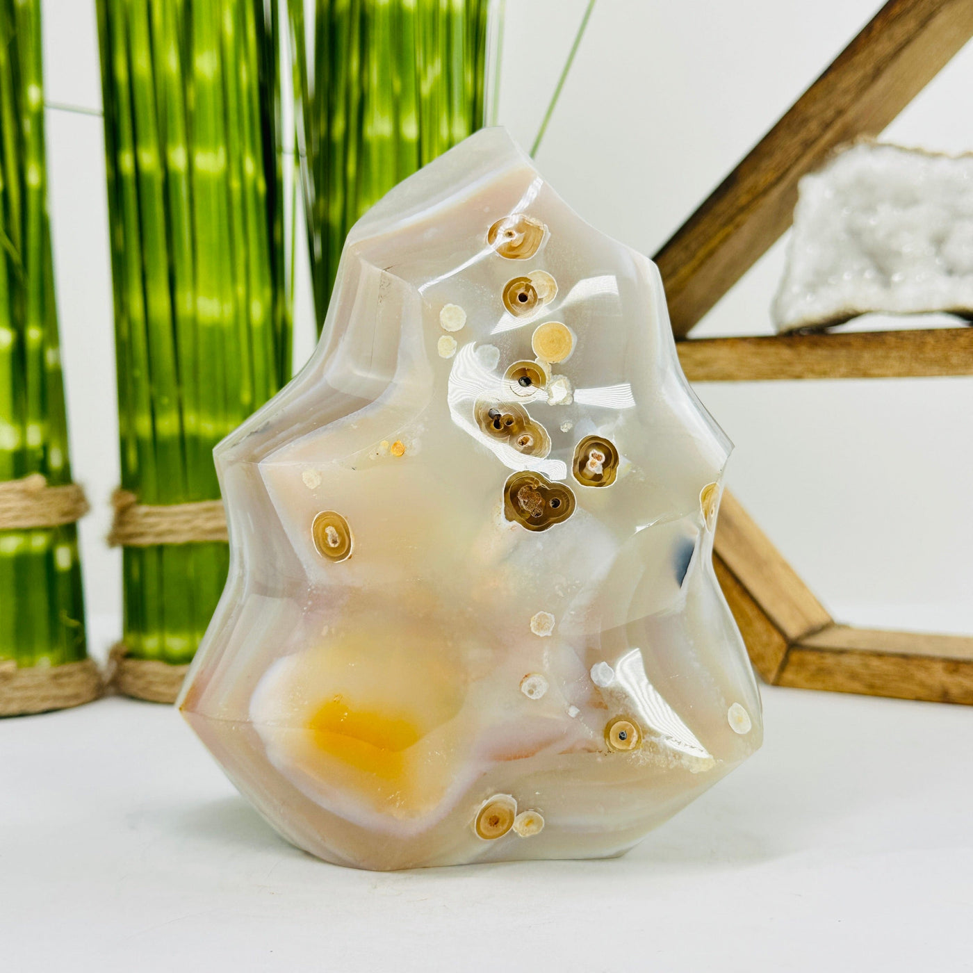 natural agate flame tower with decorations in the background