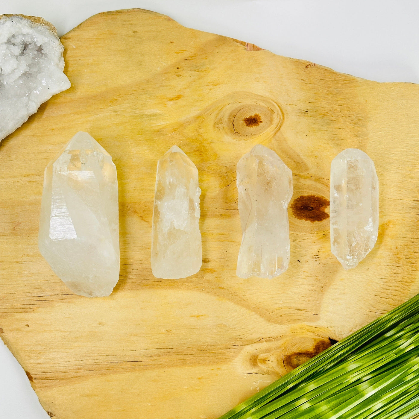 crystal quartz points with decorations in the background