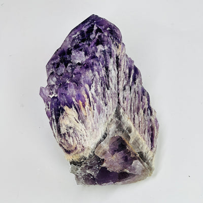 top view of amethyst cluster on white background