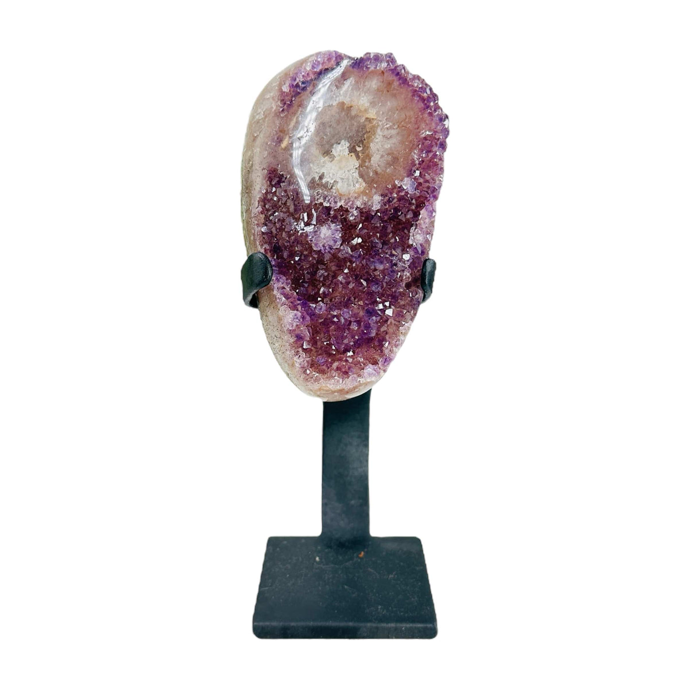 amethyst on stand on white background