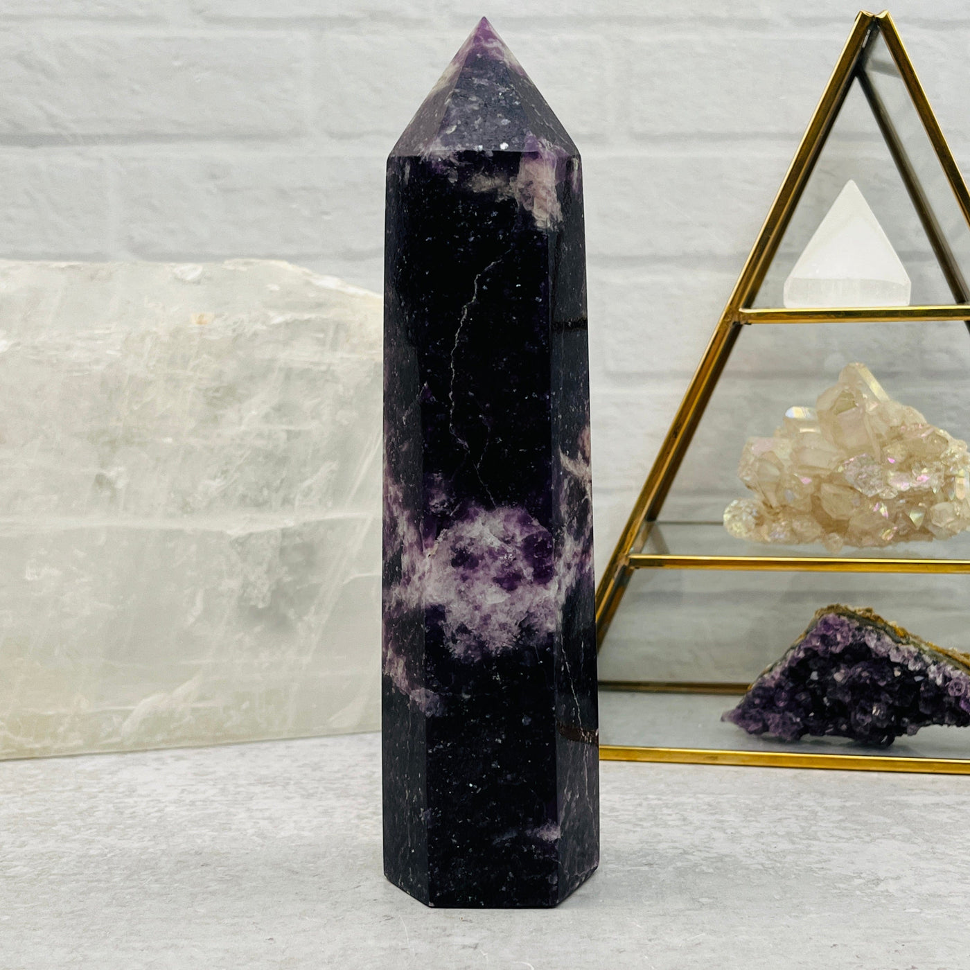 lepidolite point displayed as home decor 