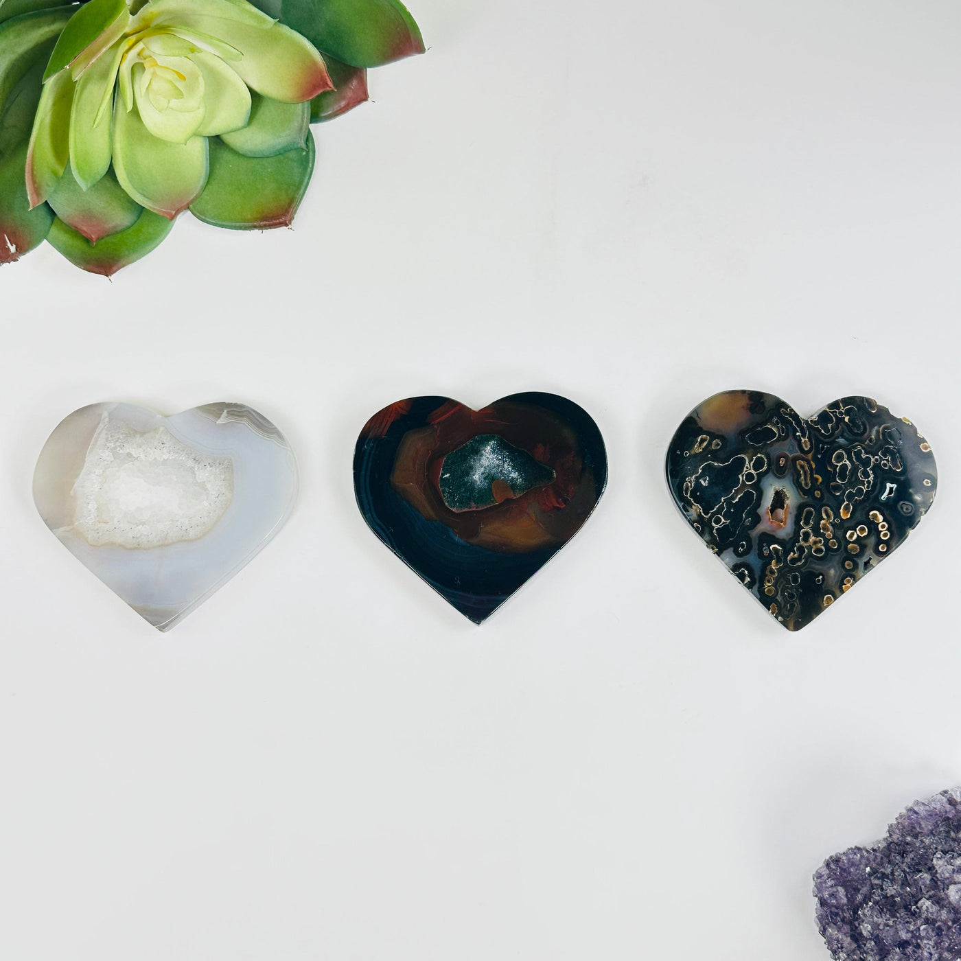 all variants of Natural Agate Heart Slices with decorations on white background
