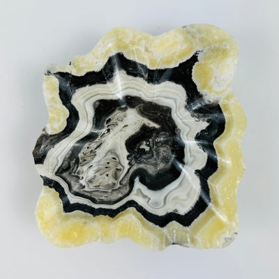 Top view of Mexican onyx bowl on white background