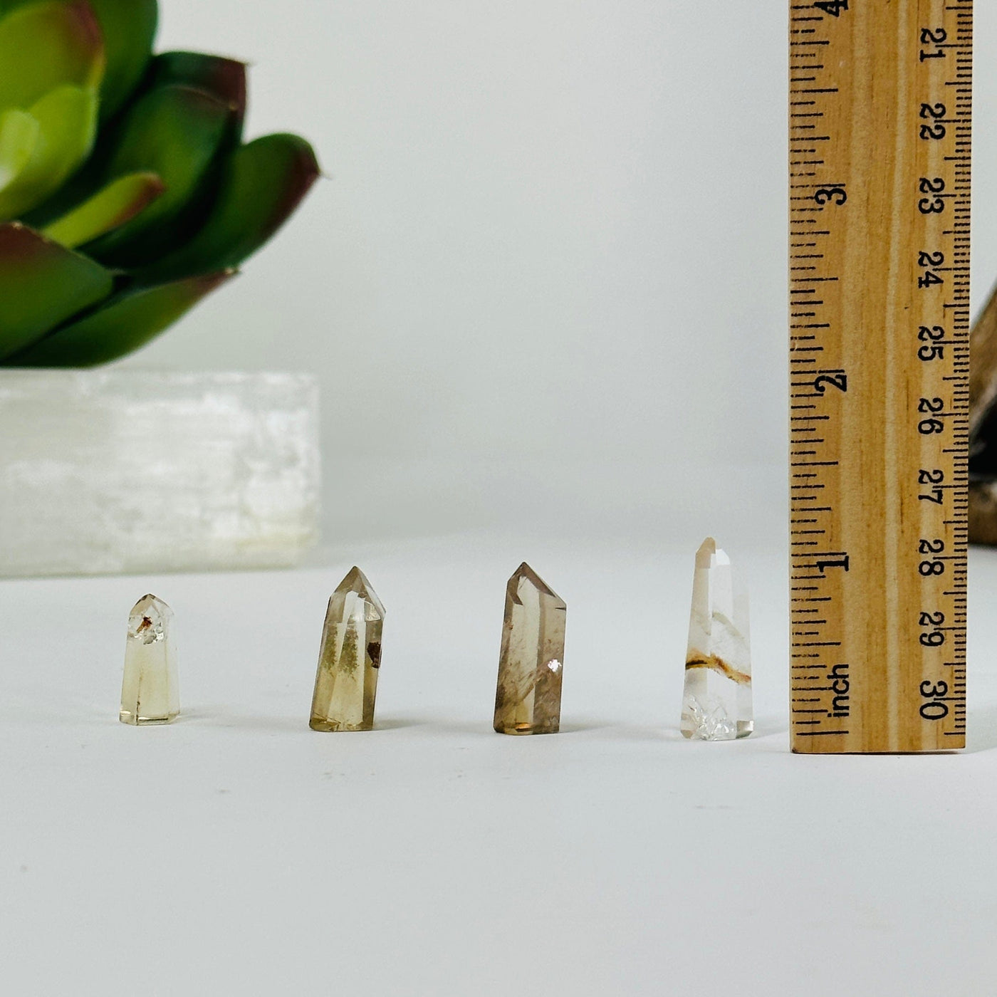 lodalite points next to a ruler for size reference