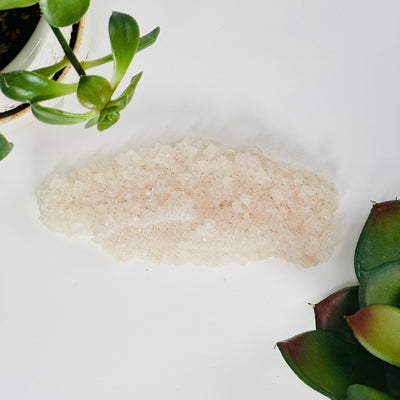 halite cluster with decorations in the background