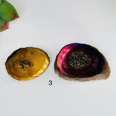 rainbow and gold titanium coated geode box with decorations in the background