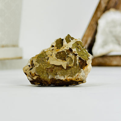 epidote freeform with decorations in the background