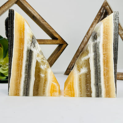 Mexican onyx bookends with decorations in the background