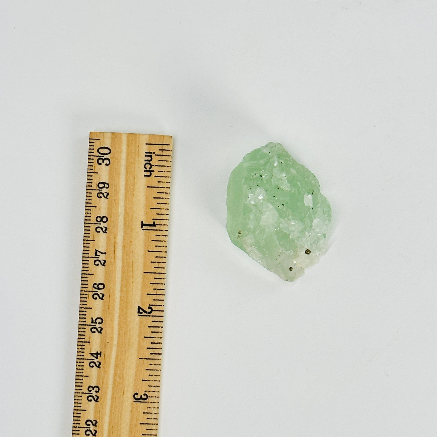 Green Fluorite with Epidote and Crystal Quartz Growth Cluster next to a ruler for size reference