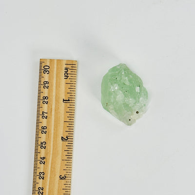 Green Fluorite with Epidote and Crystal Quartz Growth Cluster next to a ruler for size reference