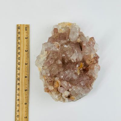 lithium quartz formation next to a ruler for size reference