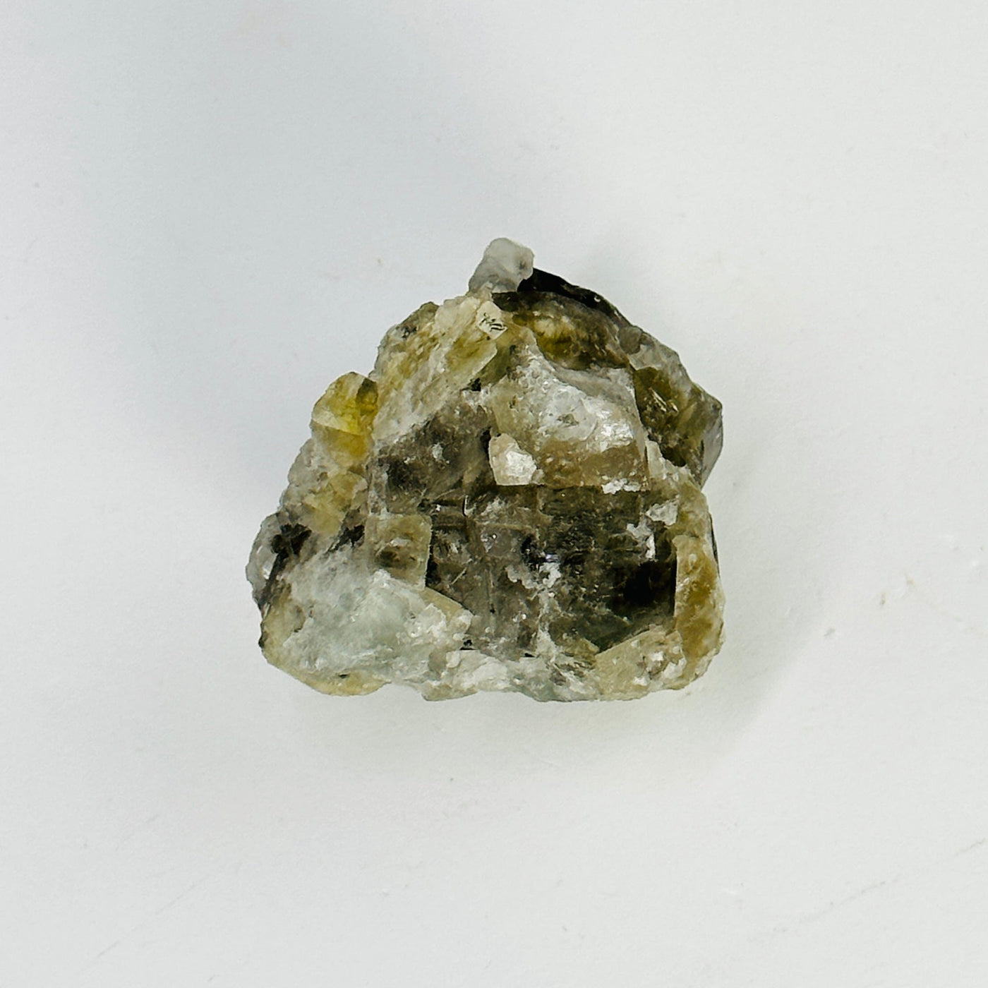 epidote with crystal quartz growth cluster on white background