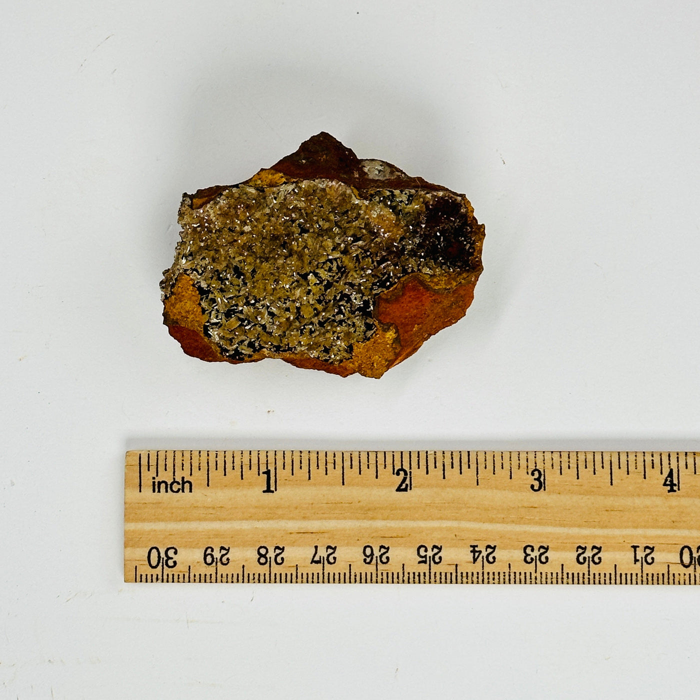 hemimorphite formation next to a ruler for size reference
