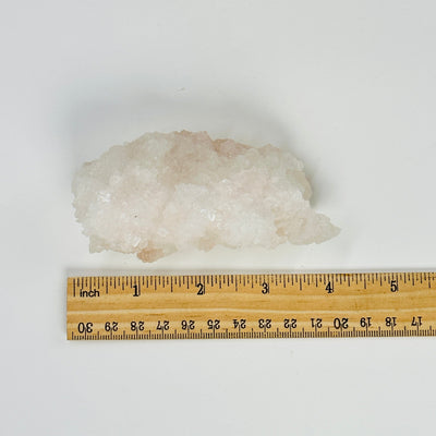 Halite freeform next to a ruler for size reference