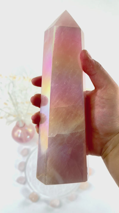 Angel Aura Rose Quartz Tower video in hand to show iridescence