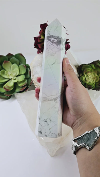 White Howlite Aura Crystal Obelisk #2 video with obelisk in hand for size reference showing angel aura effect