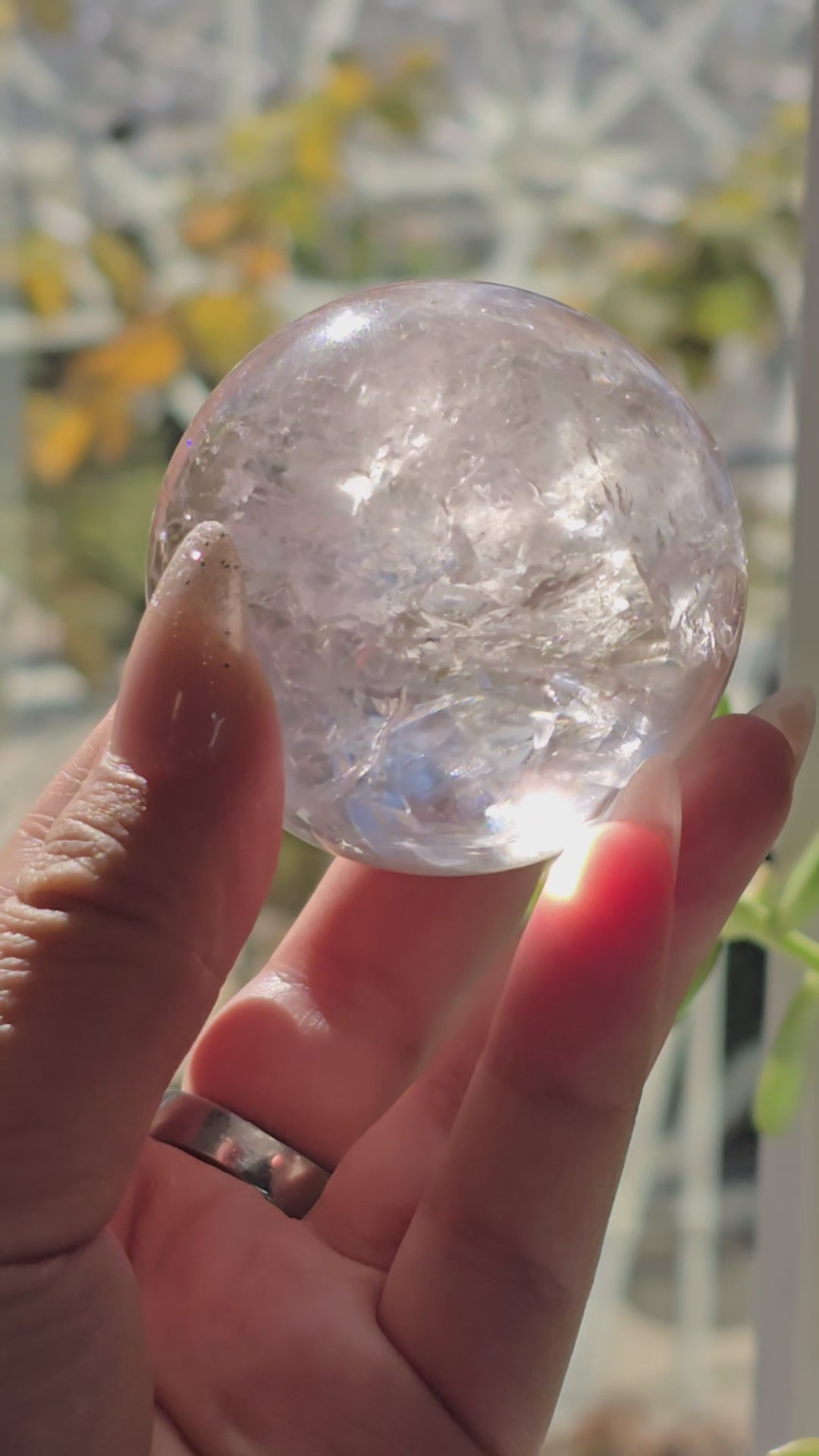 Rose de France Amethyst Crystal Sphere - One of a Kind video showing inclusions of sphere in hand for size reference