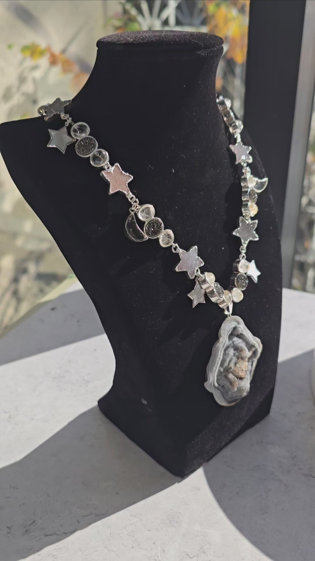 Chalcedony Druzy Galaxy Pendant Sterling Silver Necklace with Druzy and Mother-of-Pearl Stars and Crystal Quartz Moon Charms - Handmade - One-of-a-Kind video showing sparkle of necklace