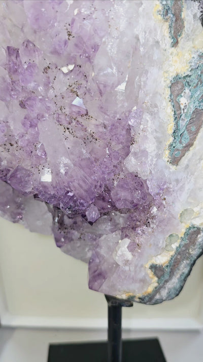 Amethyst Lemurian Crystal Cluster on Metal Stand - One-of-a-Kind video with light showing lemurian etchings on crystals
