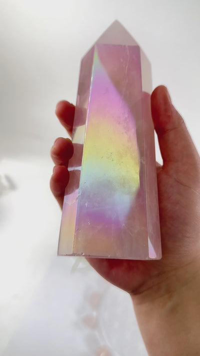 Angel Aura Rose Quartz Generator video in hand to show iridescence