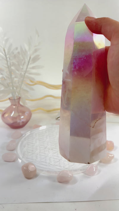 Angel Aura Rose Quartz Tower with Natural Inclusions video in hand to show iridescence