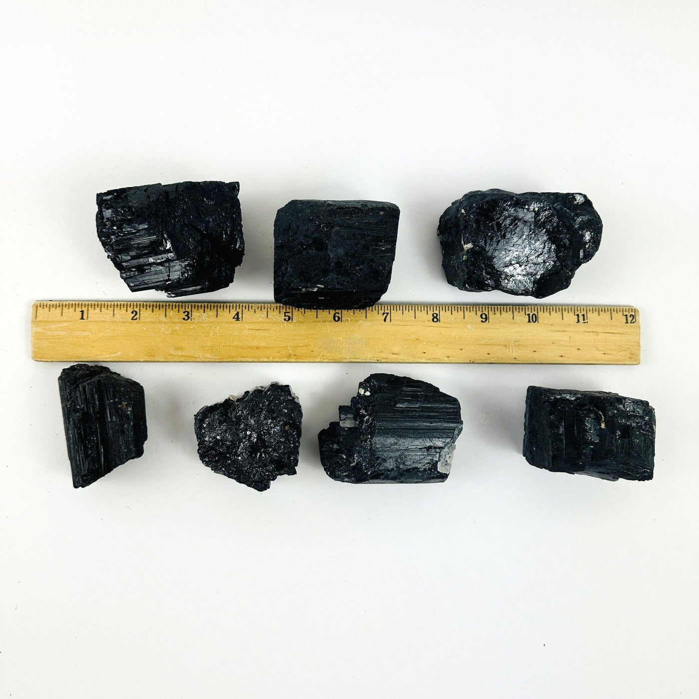 Tourmaline Crystal Chunks next to a ruler for size reference