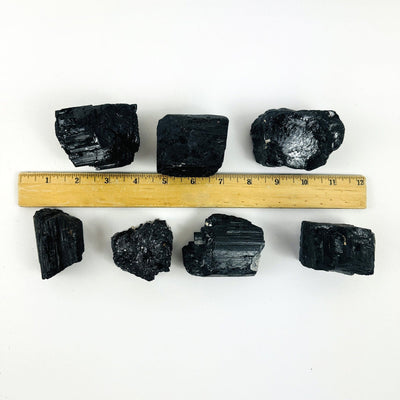 Tourmaline Crystal Chunks next to a ruler for size reference