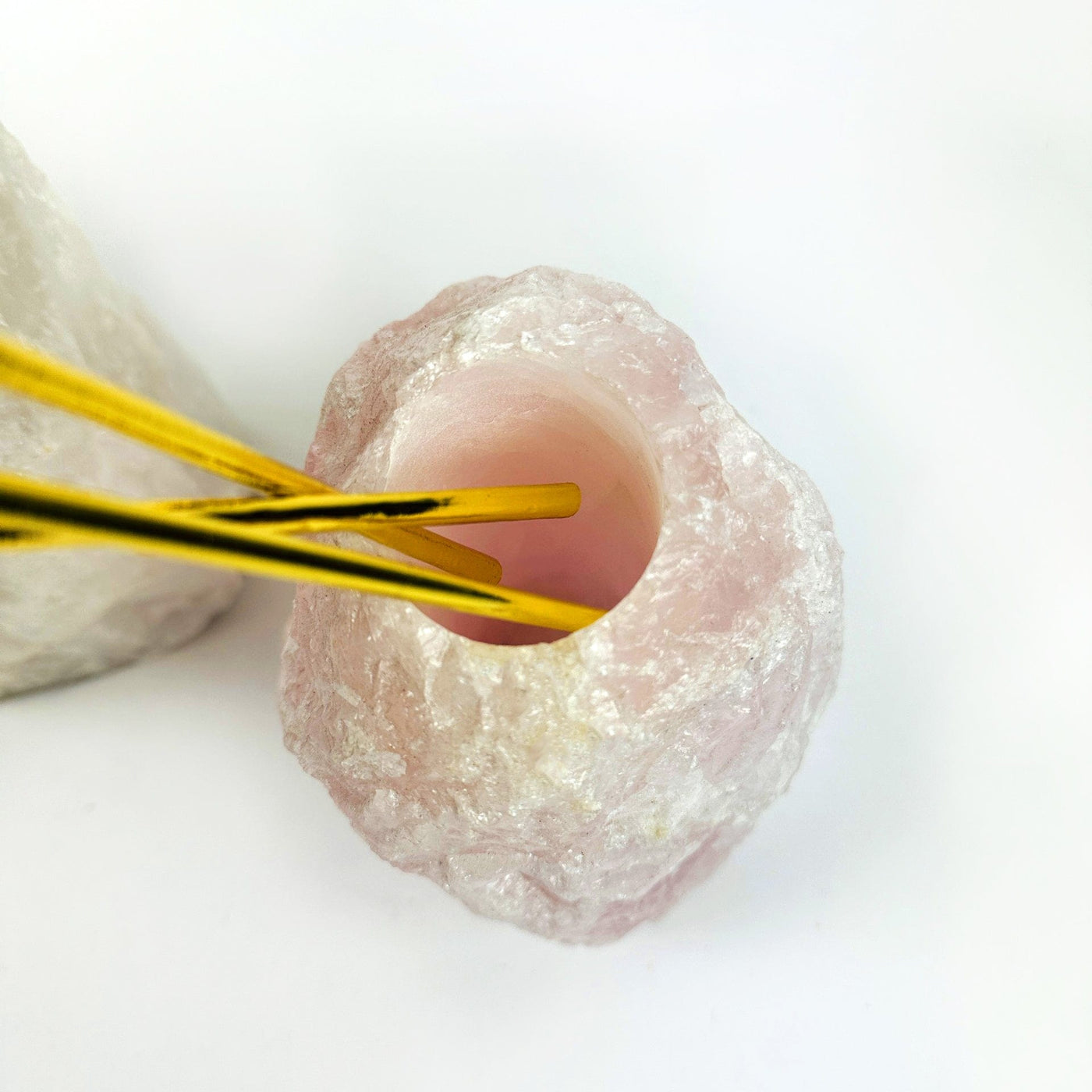 Natural Stone Vase of rose quartz, looking in to the hole opening