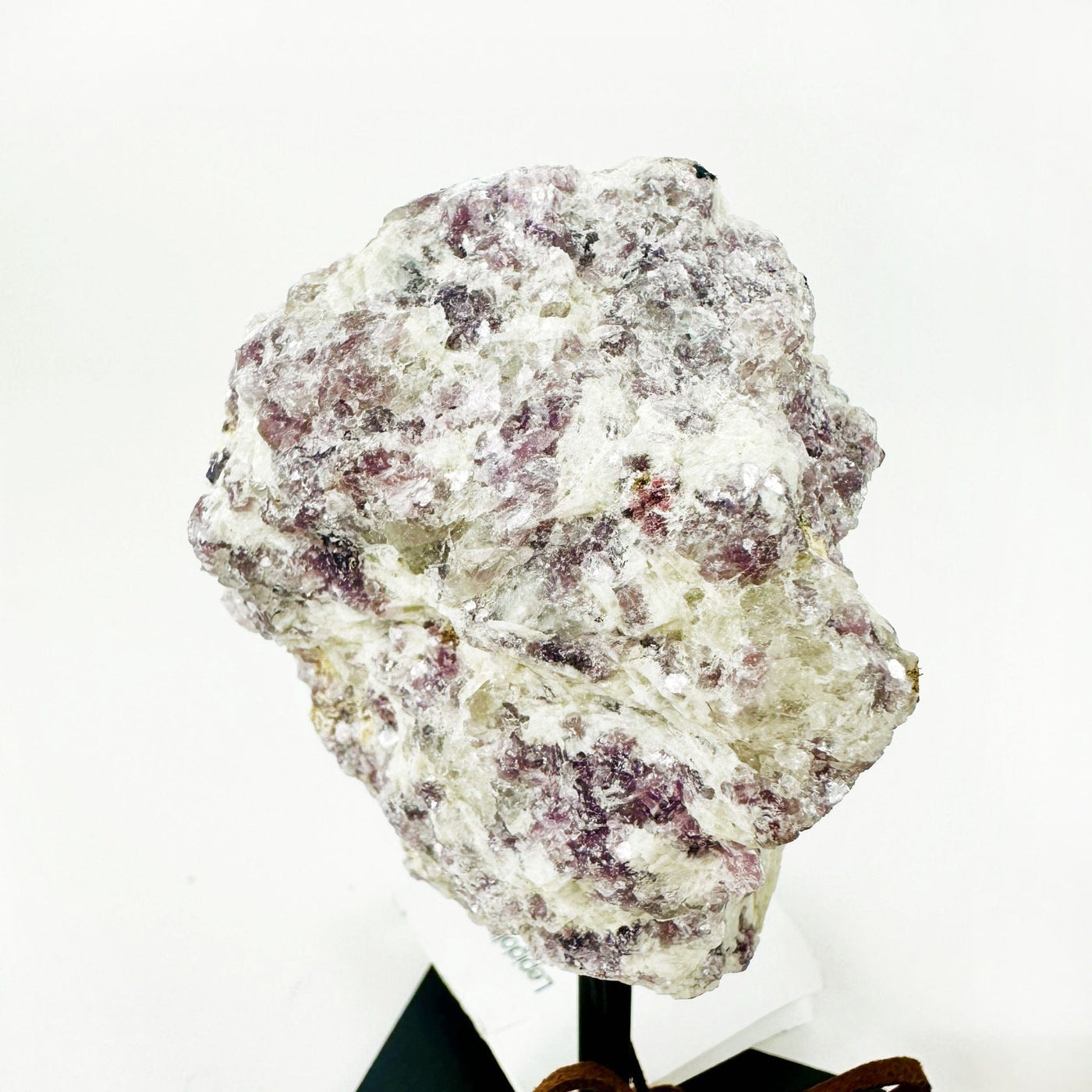 Lepidolite on Metal Stand up close of stone