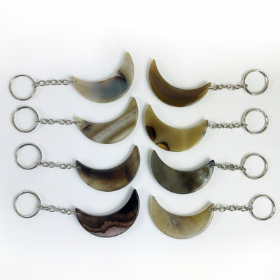 Crescent Moon Agate Key Chains in natural color showing variation