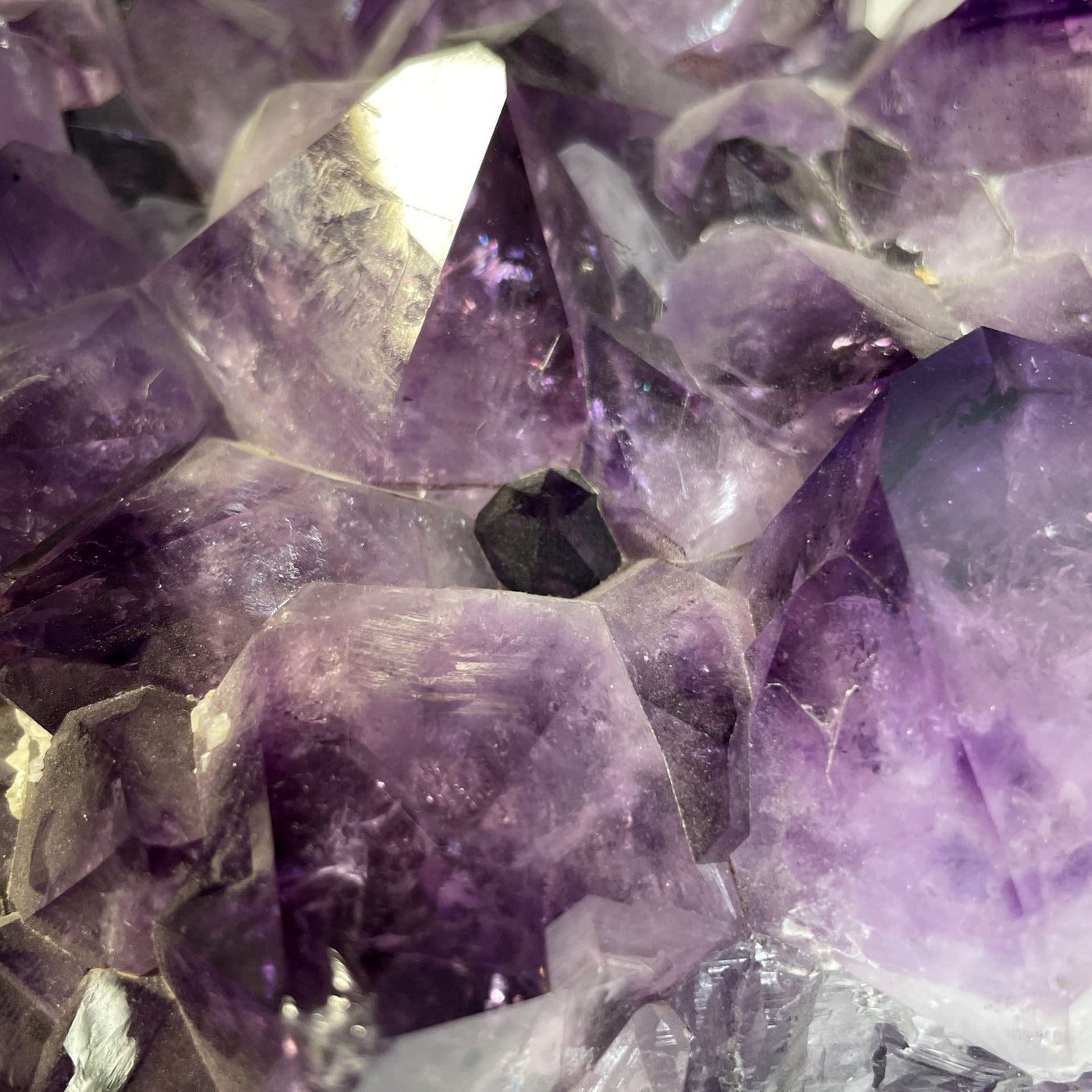 Amethyst Crystal Cluster on Wooden Base close up