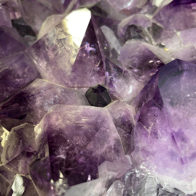 Amethyst Crystal Cluster on Wooden Base close up