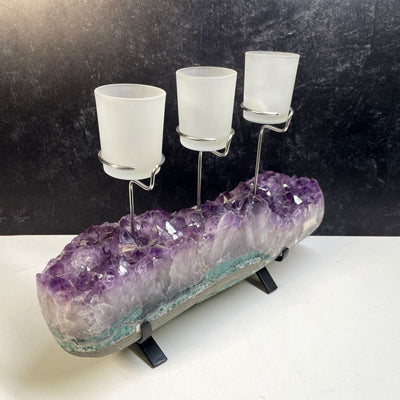 Amethyst Cluster Base with 3 Votive Candle Holders from a side angle view