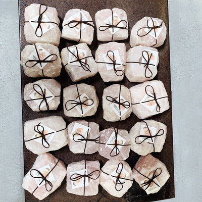 twenty rose quartz candle holders shown looking down from above
