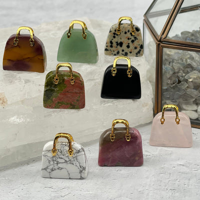 purses displayed to show the differences in the gemstone types 